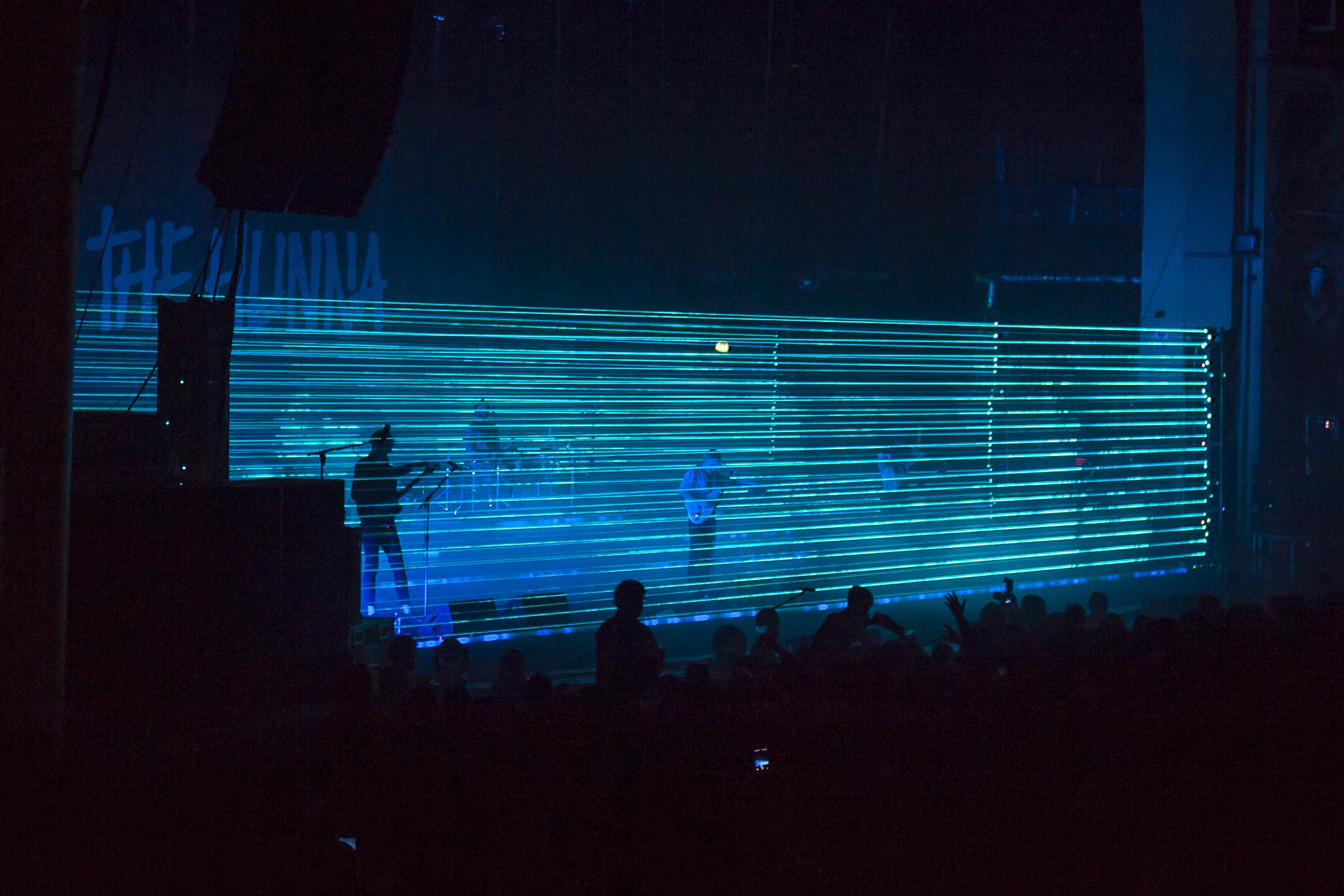 The Hunna (Hun1301188171) © Lindsay Cave @loosplat - MDG's ATMe hazer and ICE FOG Compack combine to showcase the laser work in Tom Campbell's lighting design.